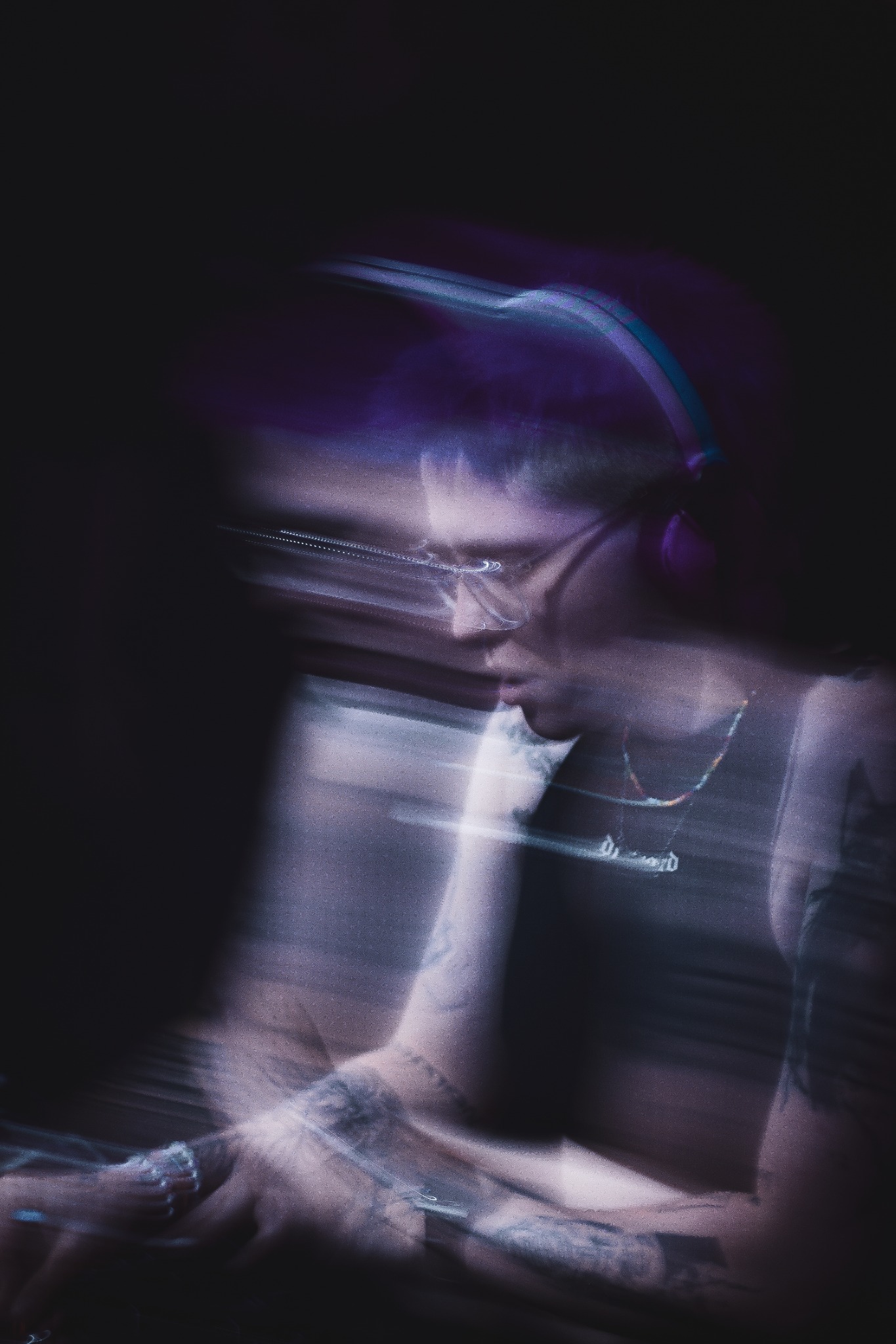 Motion portrait of a DJ performing live