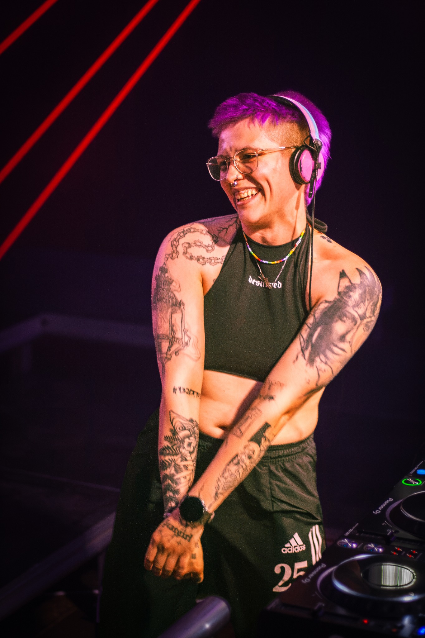 Smiling DJ performing at a live show